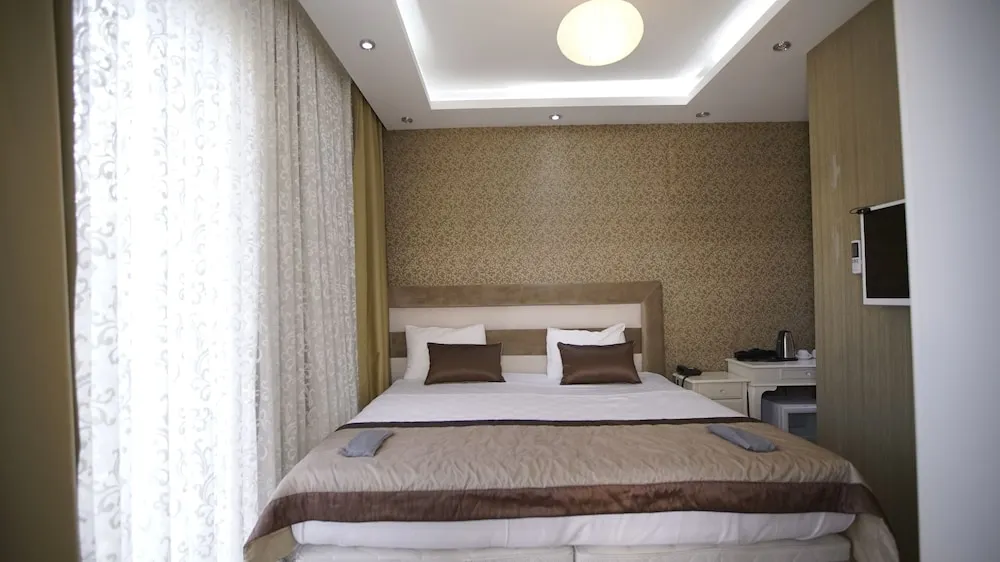 Deluxe Tek Büyük veya İki Ayrı Yataklı Oda