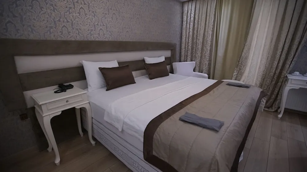 Deluxe Tek Büyük veya İki Ayrı Yataklı Oda