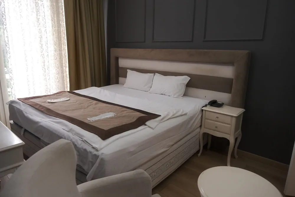 Deluxe Tek Büyük veya İki Ayrı Yataklı Oda