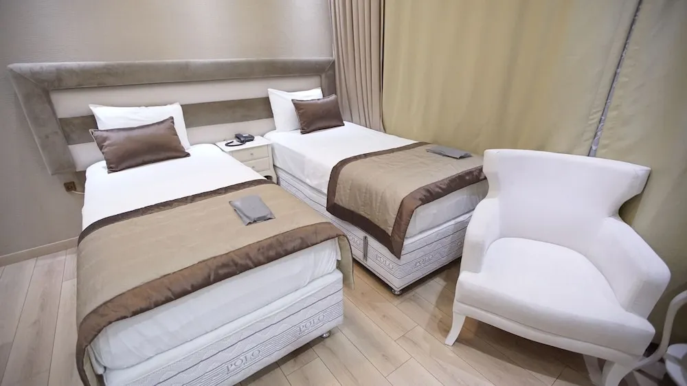 Deluxe Tek Büyük veya İki Ayrı Yataklı Oda