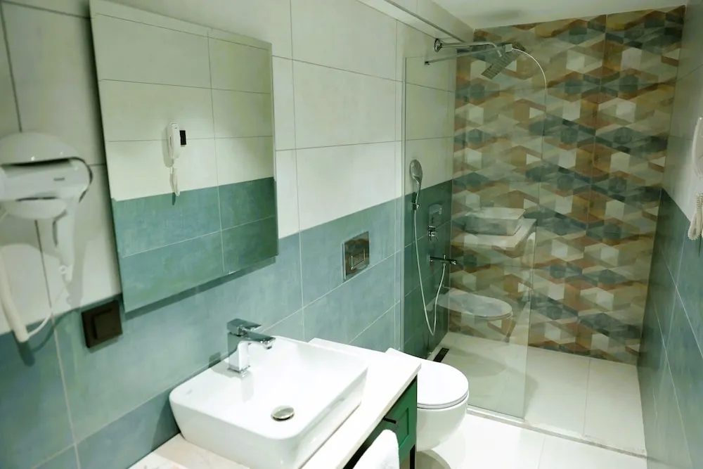 Deluxe Üç Kişilik Oda