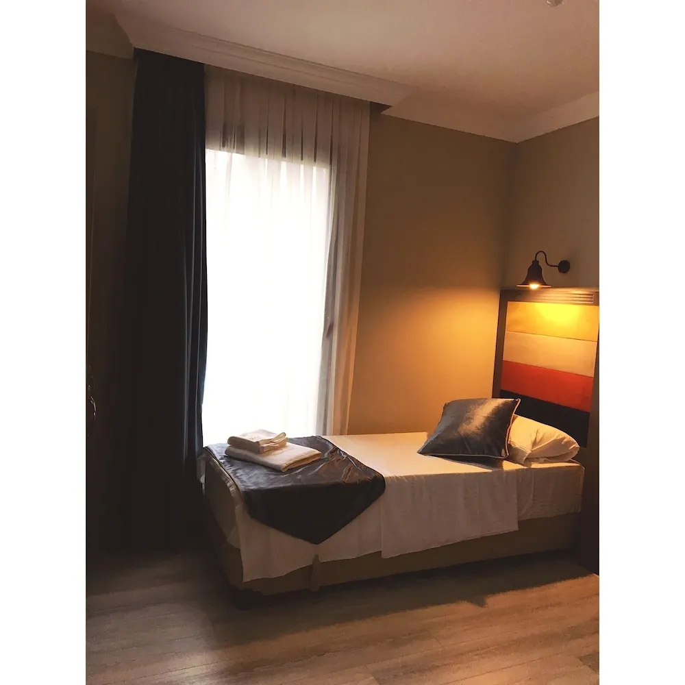 Deluxe Üç Kişilik Oda