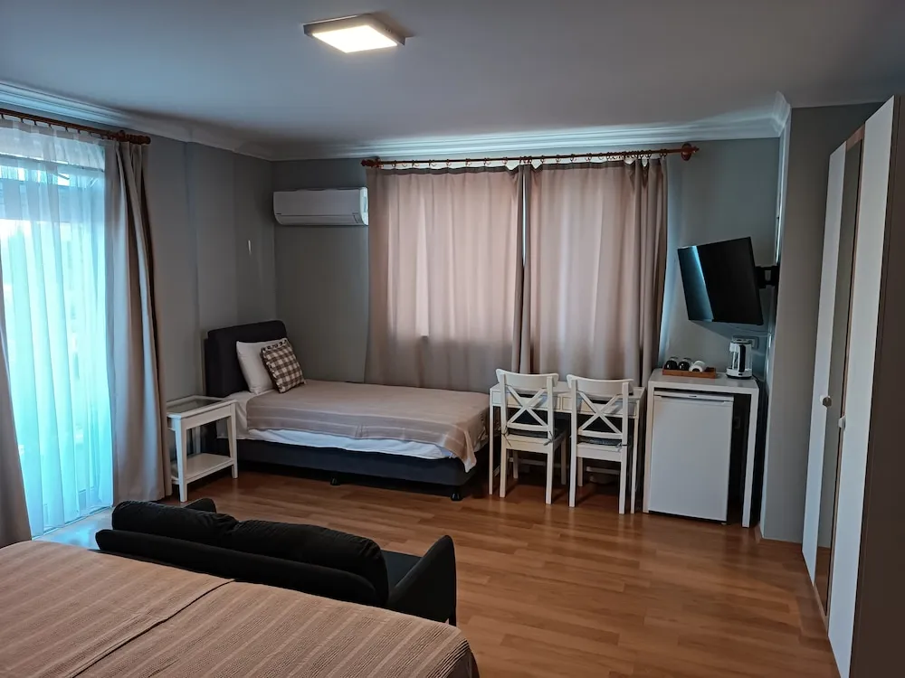 Premium Üç Kişilik Oda