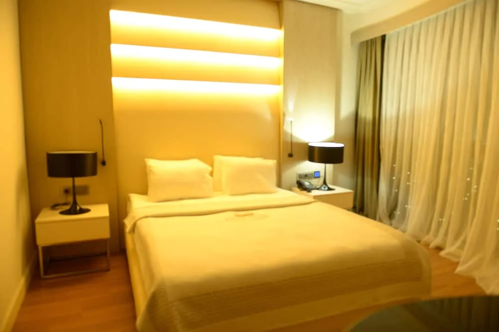 Deluxe Tek Büyük veya İki Ayrı Yataklı Oda