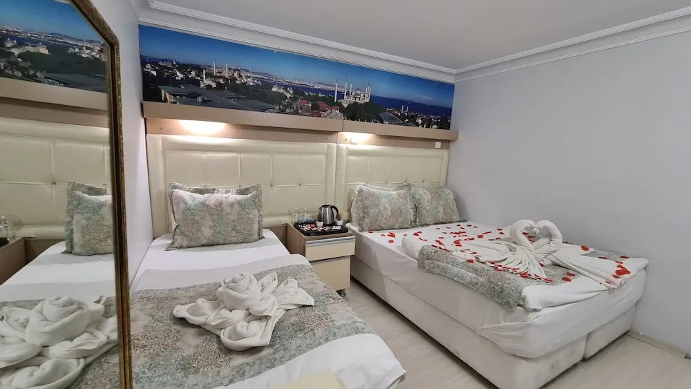 Üç Kişilik Oda