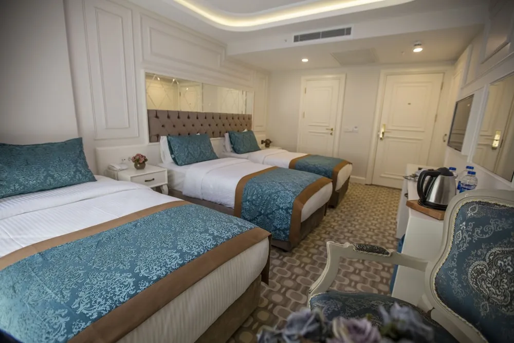 Deluxe Üç Kişilik Oda