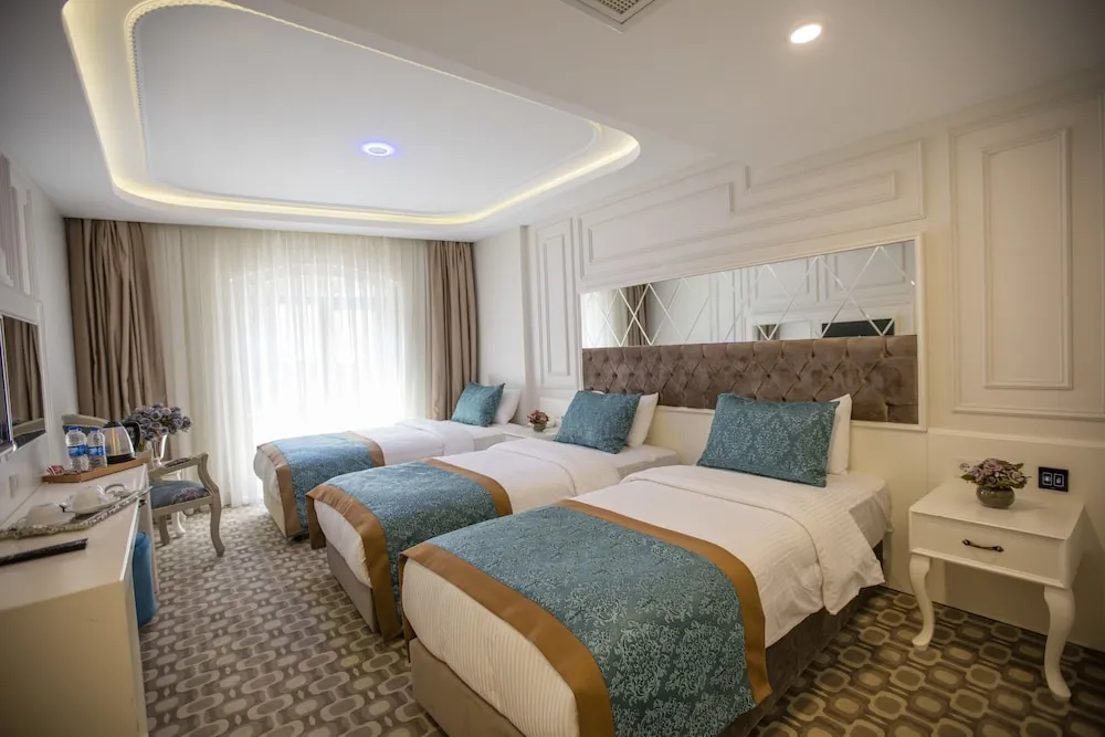 Deluxe Üç Kişilik Oda