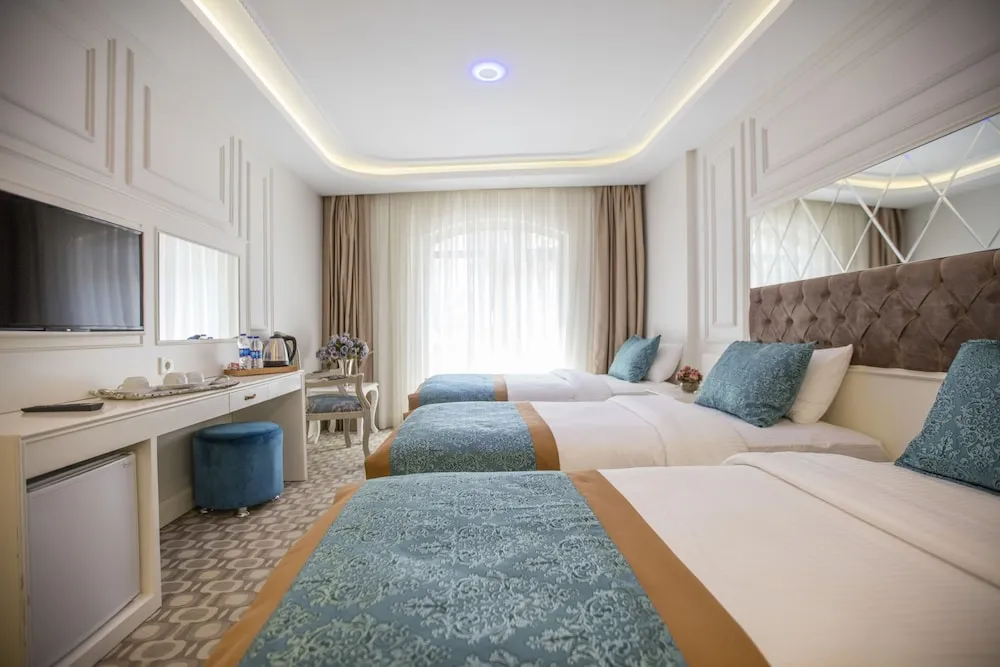 Deluxe Üç Kişilik Oda