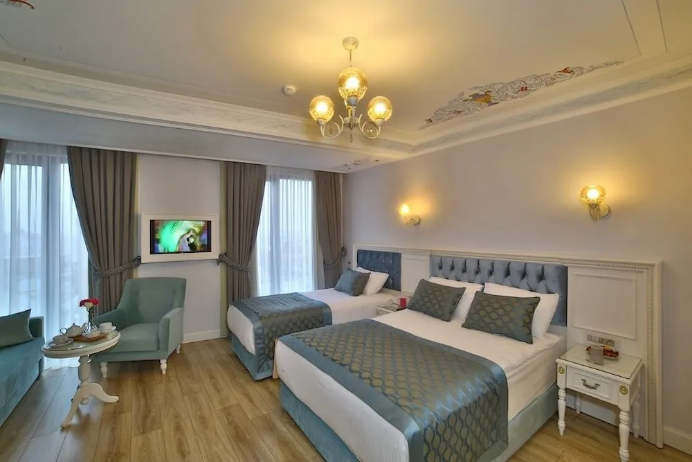Deluxe Üç Kişilik Oda, Denize Bakan
