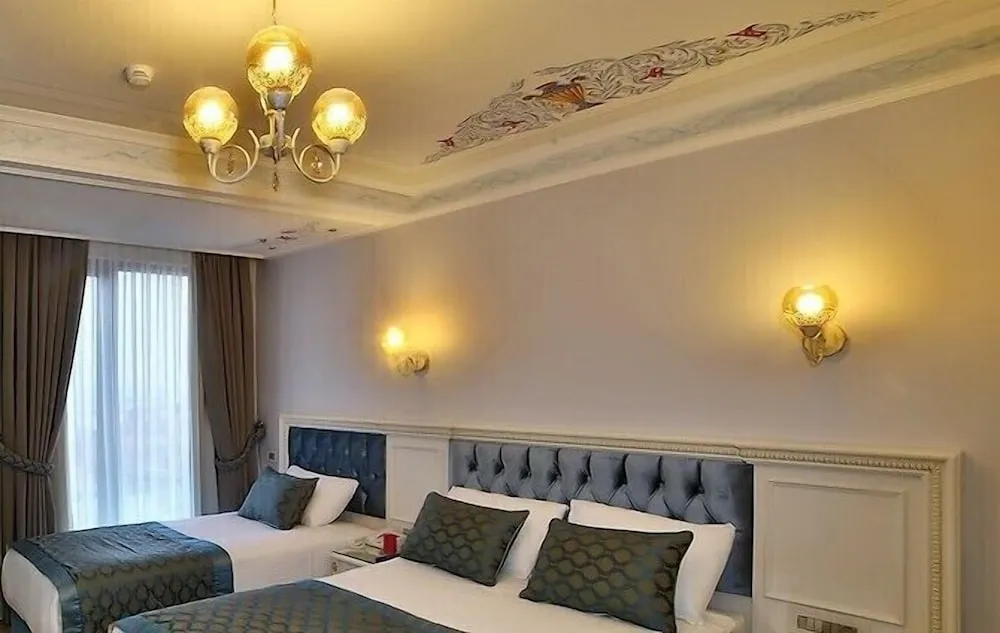 Deluxe Üç Kişilik Oda, Denize Bakan