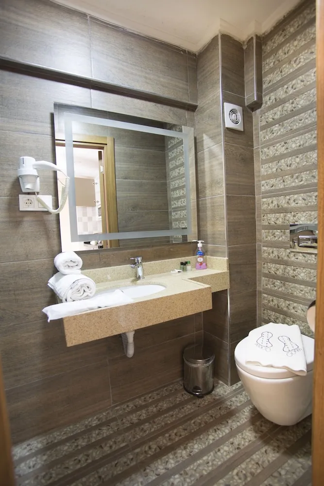 Deluxe Üç Kişilik Oda