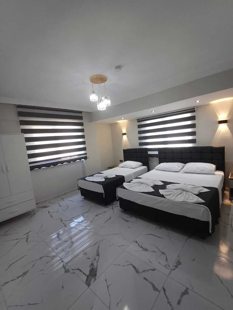 Deluxe Üç Kişilik Oda