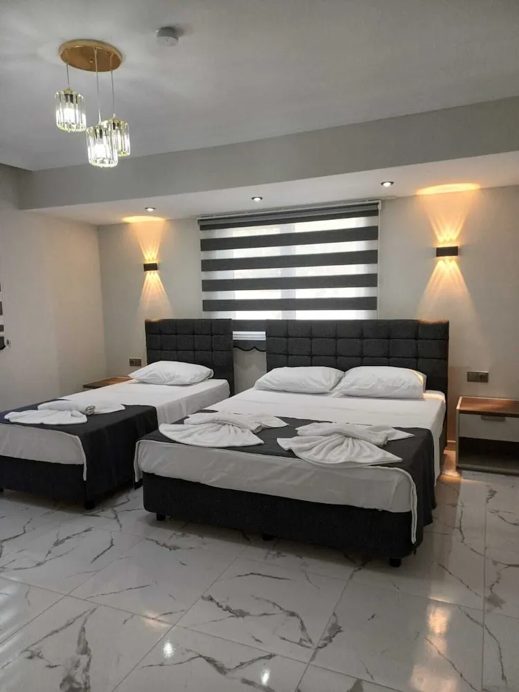 Deluxe Üç Kişilik Oda
