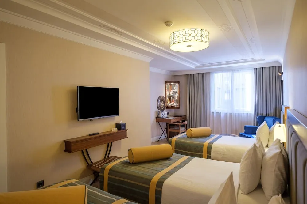 Deluxe Üç Kişilik Oda