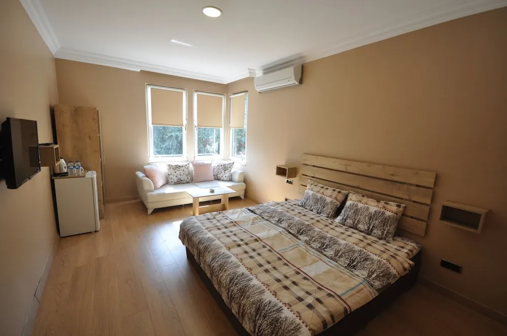 Deluxe Üç Kişilik Oda