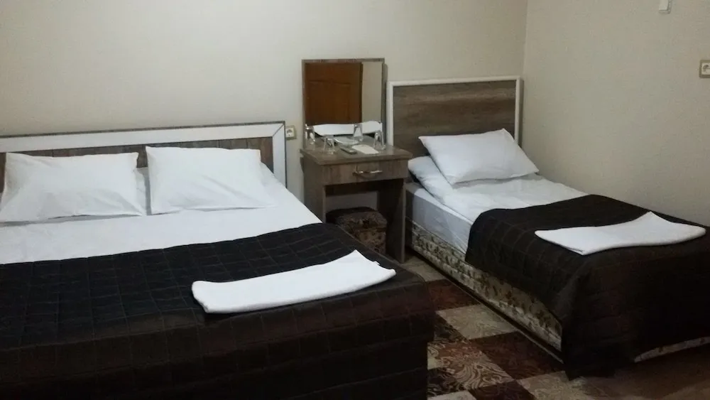 Üç Kişilik Oda