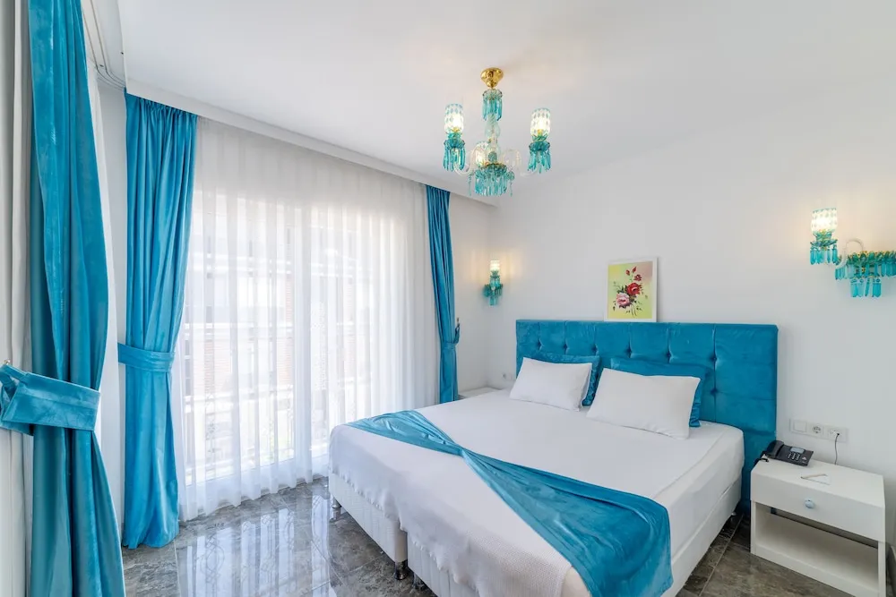 Deluxe Dört Kişilik Oda