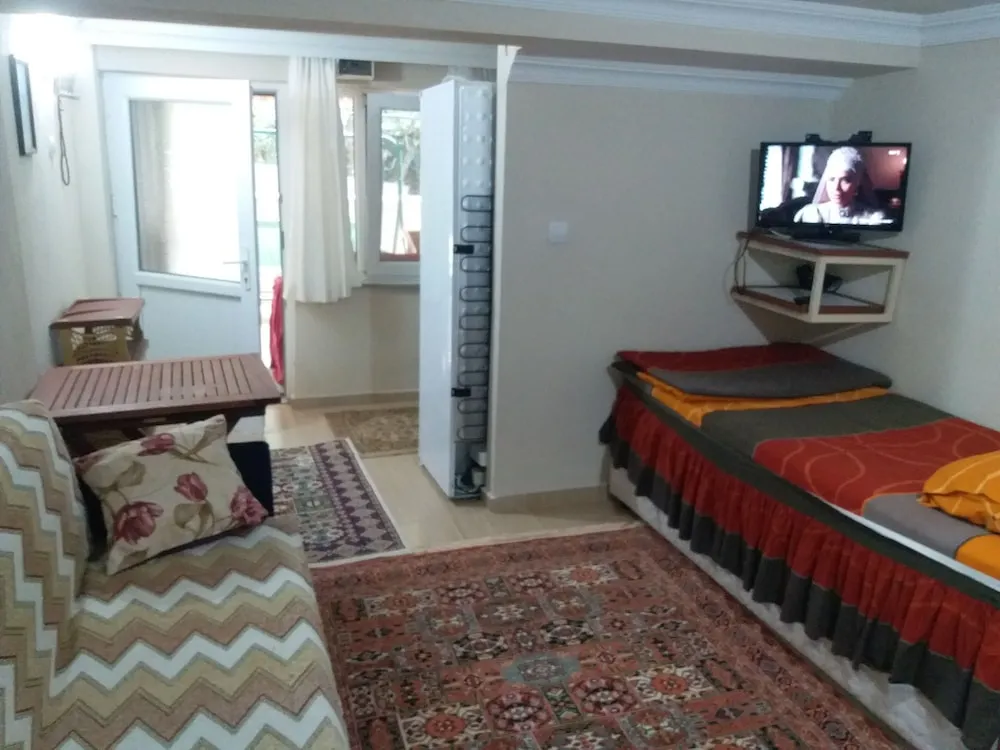 Standard Dört Kişilik Oda, Bahçe Manzaralı