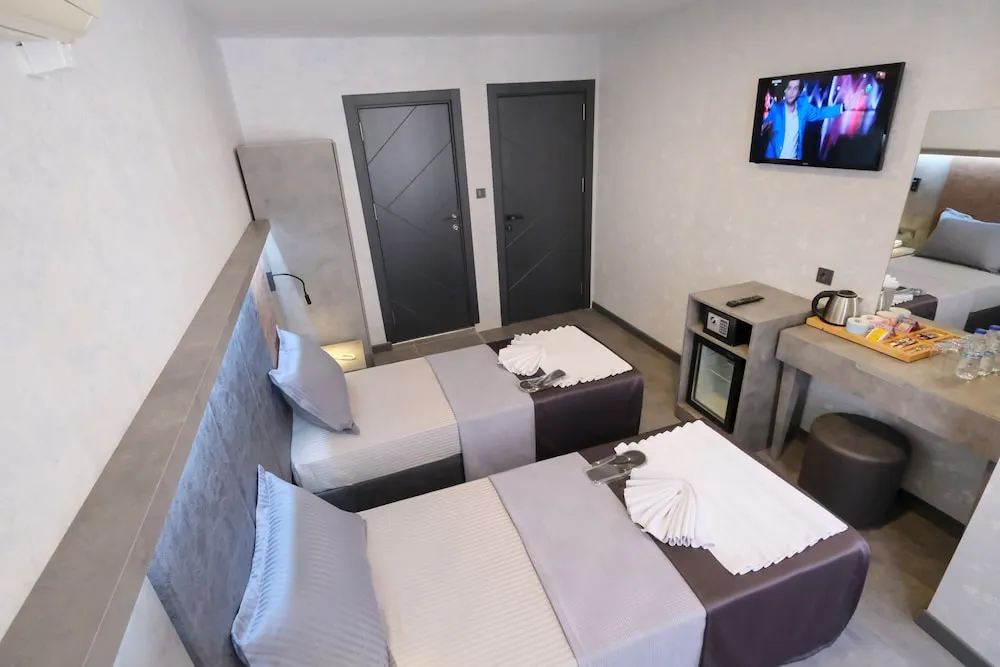 Deluxe Tek Büyük veya İki Ayrı Yataklı Oda