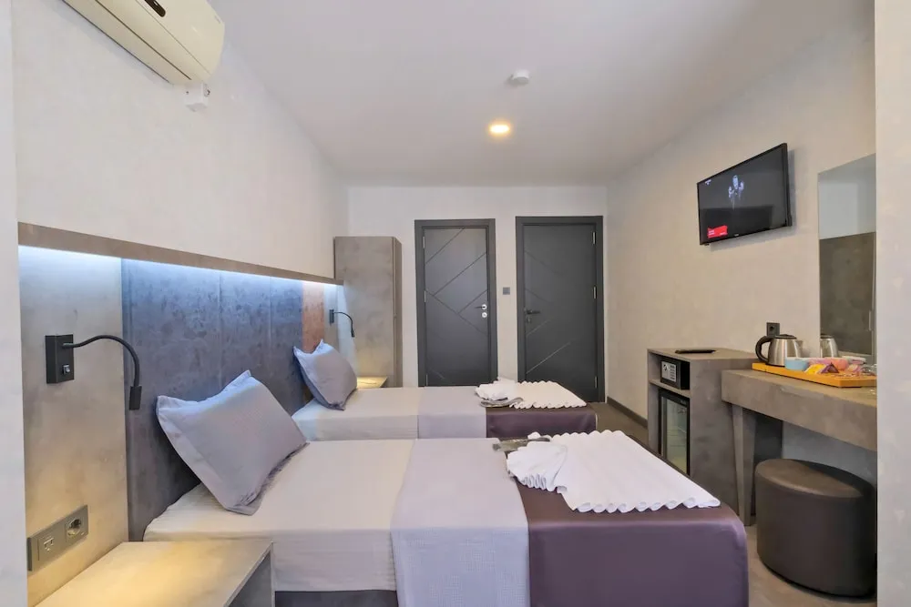 Deluxe Tek Büyük veya İki Ayrı Yataklı Oda