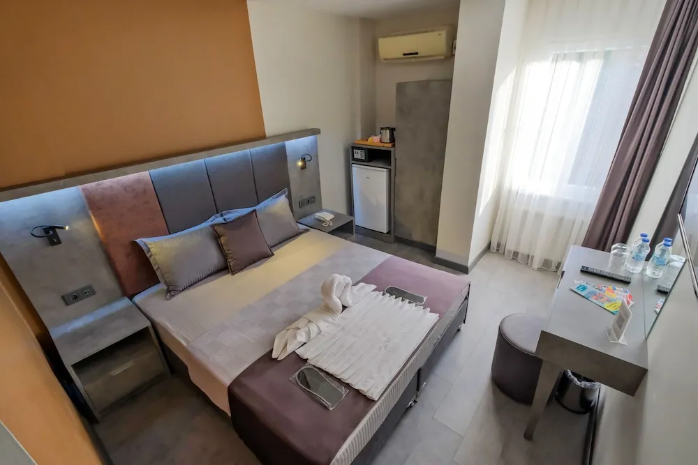 Deluxe Tek Büyük veya İki Ayrı Yataklı Oda