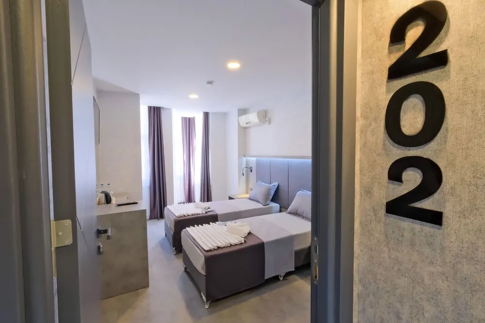 Deluxe Tek Büyük veya İki Ayrı Yataklı Oda
