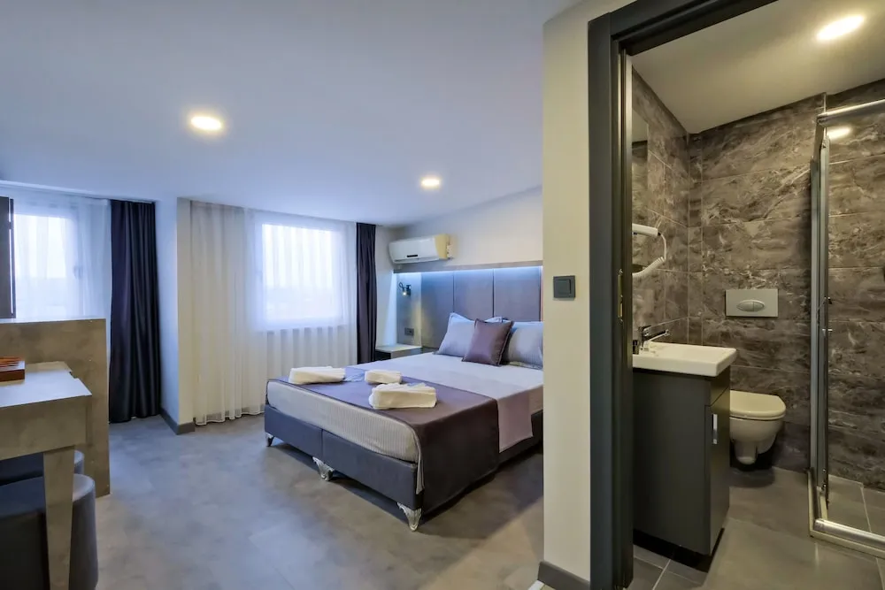 Deluxe Tek Büyük veya İki Ayrı Yataklı Oda