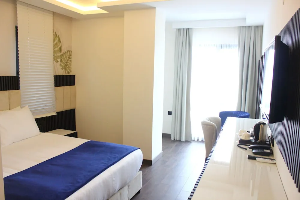 Deluxe Tek Büyük veya İki Ayrı Yataklı Oda