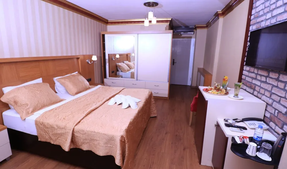 Deluxe Üç Kişilik Oda