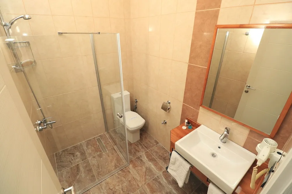 Deluxe Üç Kişilik Oda