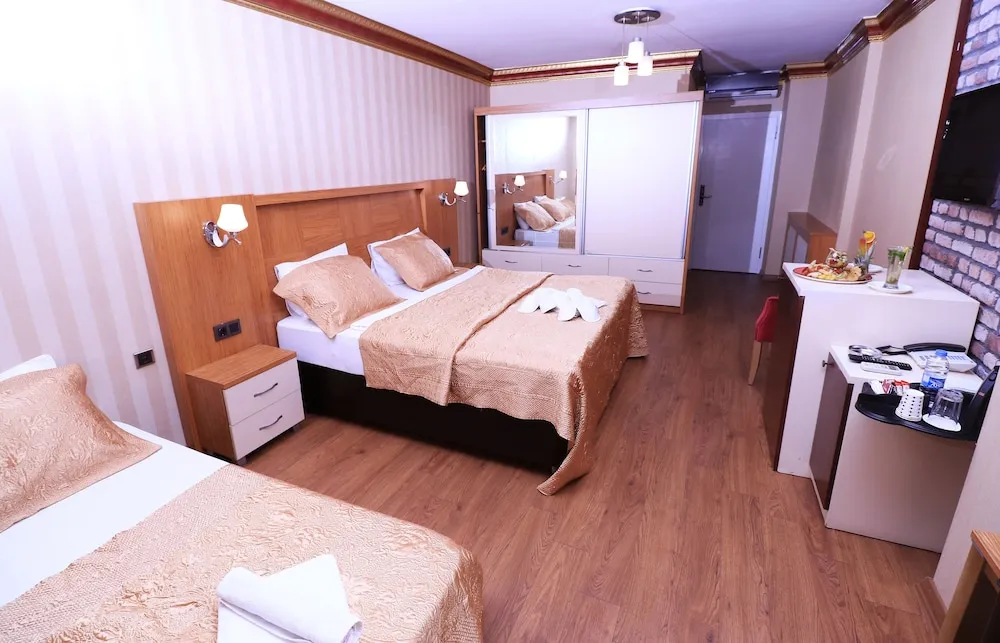 Deluxe Üç Kişilik Oda