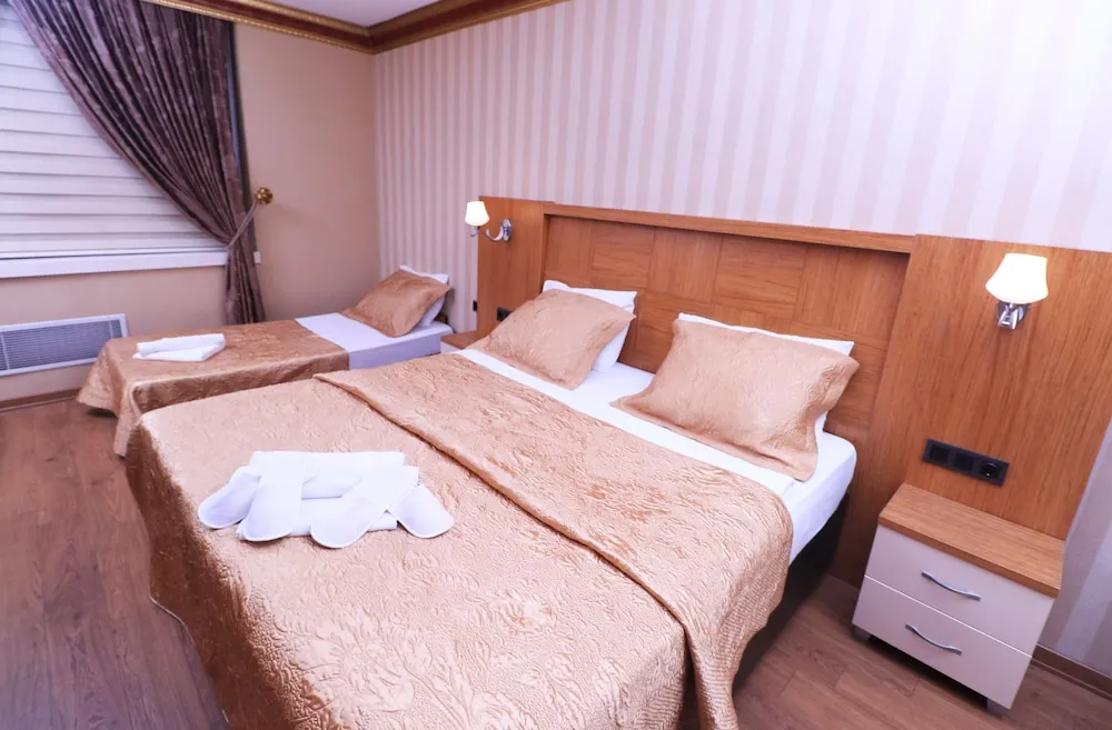 Deluxe Üç Kişilik Oda