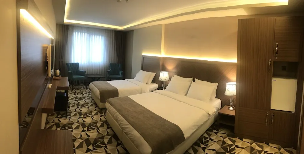 Deluxe Tek Büyük veya İki Ayrı Yataklı Oda