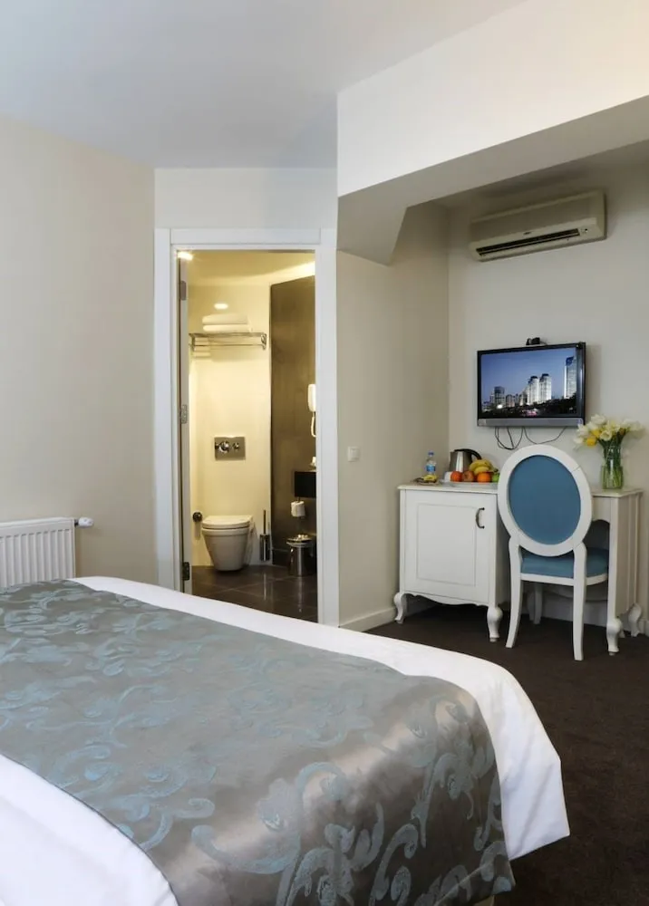 Deluxe Üç Kişilik Oda