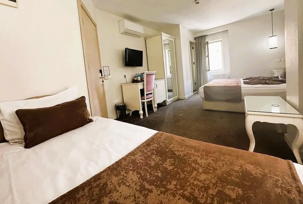 Deluxe Üç Kişilik Oda