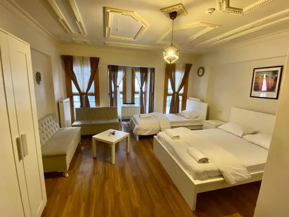 Deluxe Üç Kişilik Oda
