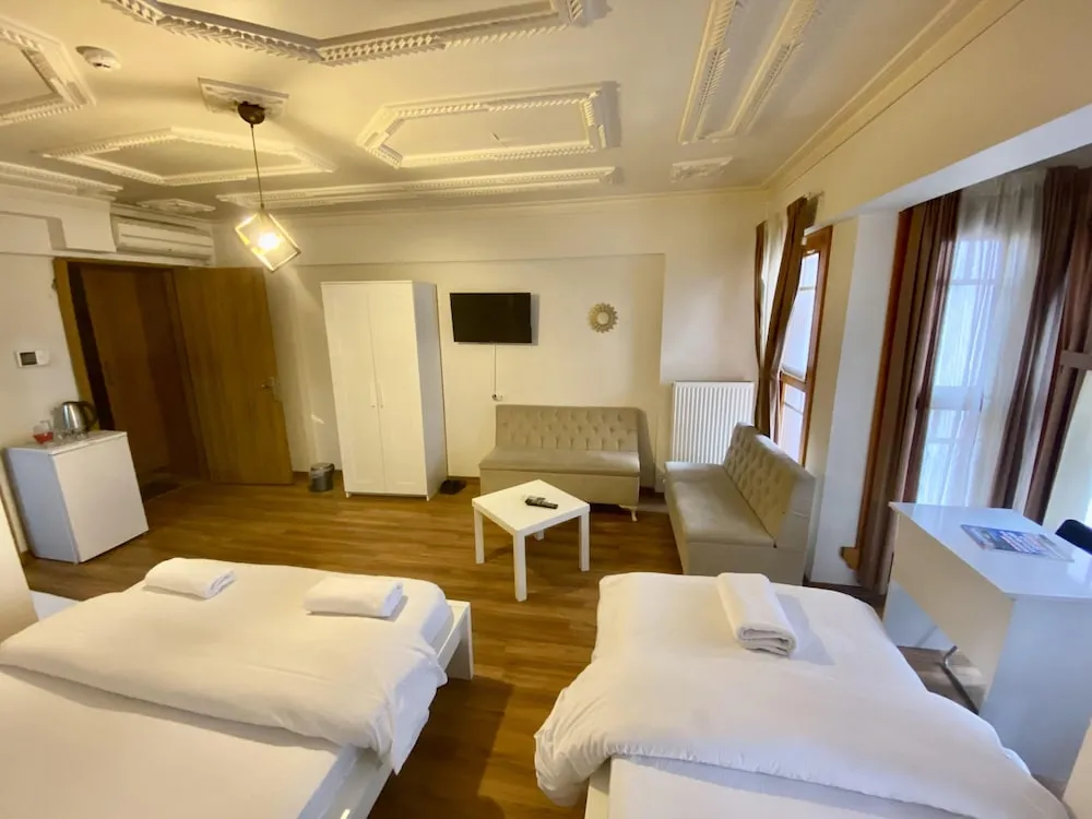 Deluxe Üç Kişilik Oda