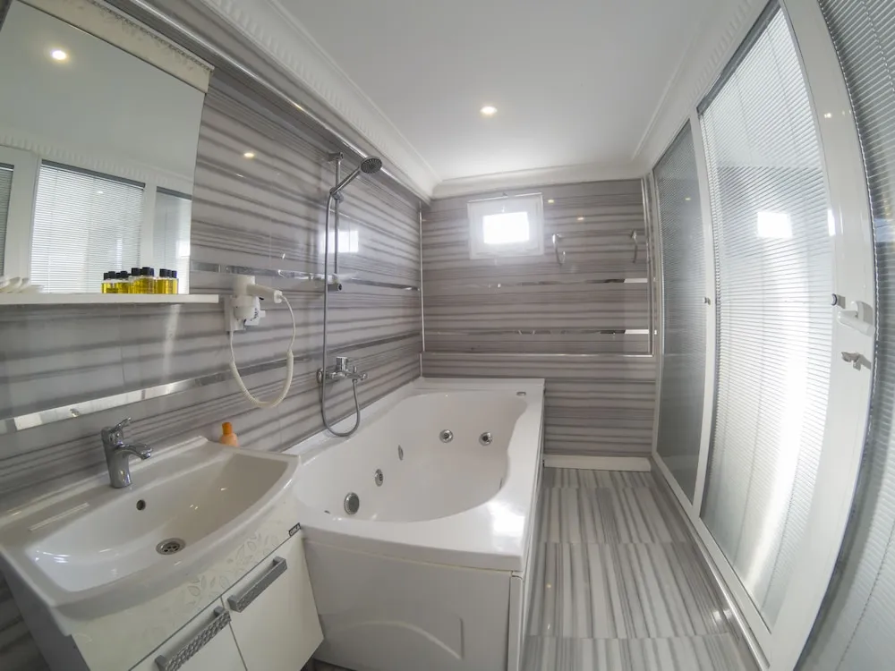Deluxe Tek Büyük veya İki Ayrı Yataklı Oda, Birden Çok Yatak Odası, Sıcak Su Küveti, Deniz Manzaralı