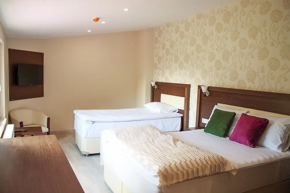 Deluxe Üç Kişilik Oda