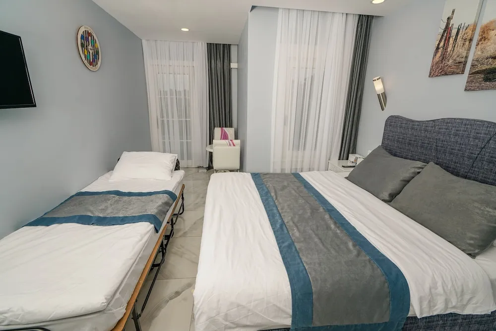 Business Üç Kişilik Oda