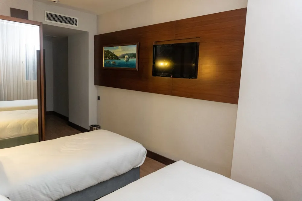 Deluxe Tek Büyük veya İki Ayrı Yataklı Oda