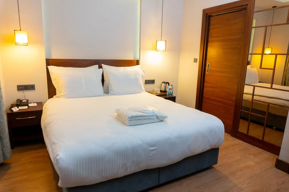 Deluxe Tek Büyük veya İki Ayrı Yataklı Oda