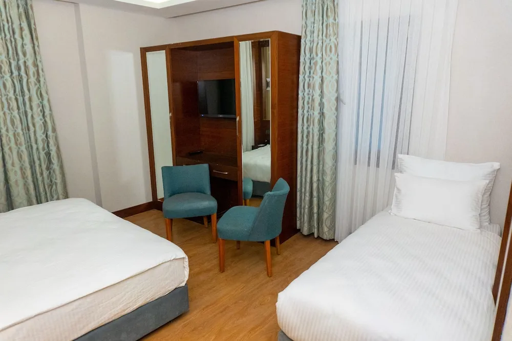 Deluxe Üç Kişilik Oda
