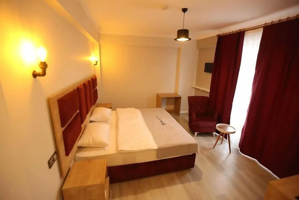 Deluxe Tek Büyük veya İki Ayrı Yataklı Oda