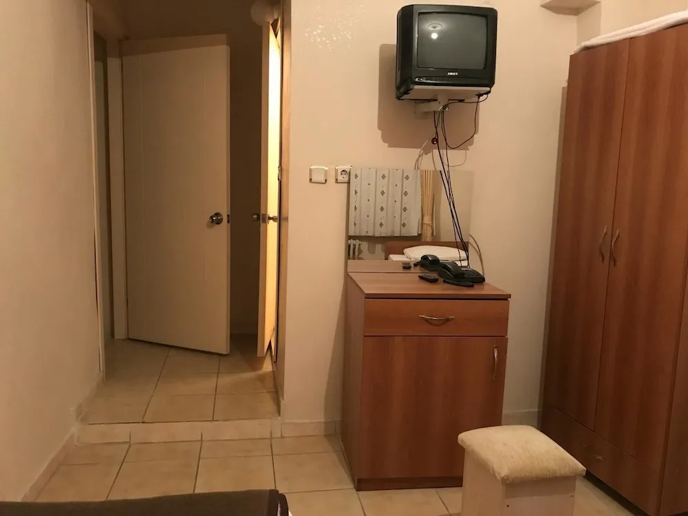 Üç Kişilik Oda