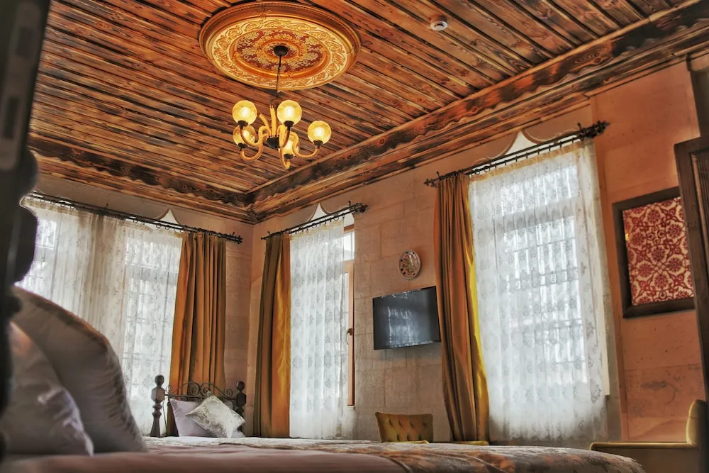 Standard Dört Kişilik Oda, Bahçe Manzaralı