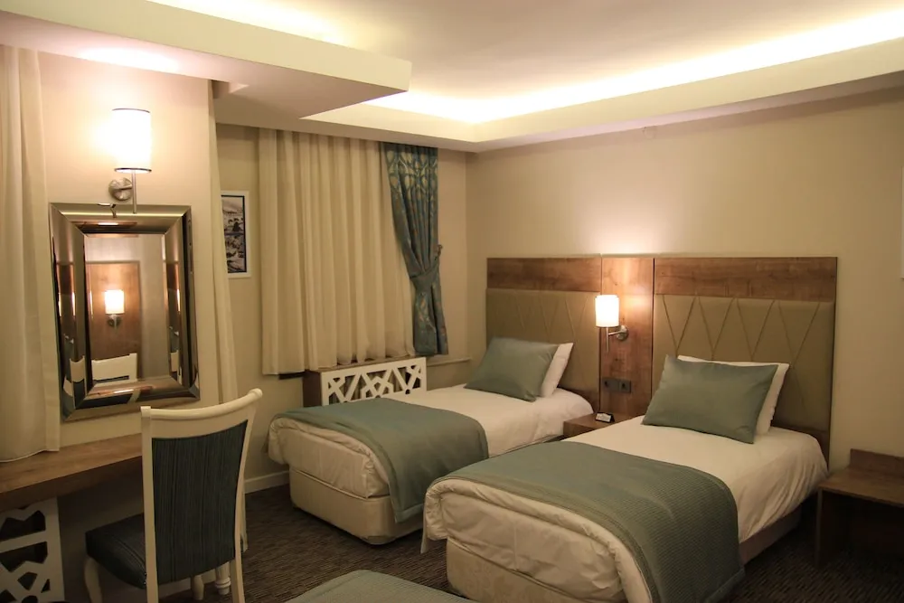 Deluxe Üç Kişilik Oda