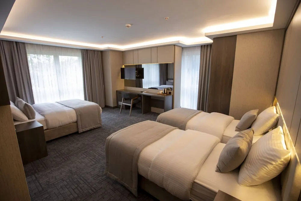 Deluxe Üç Kişilik Oda