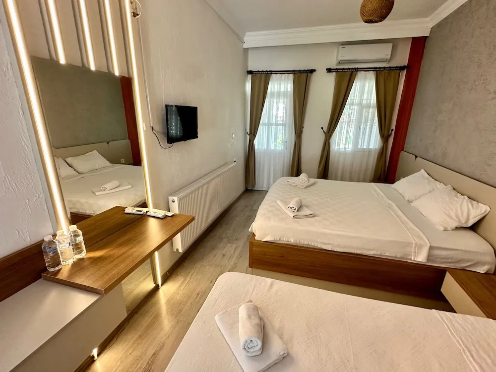 Deluxe Üç Kişilik Oda