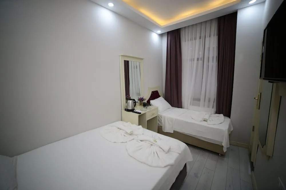 Economy Üç Kişilik Oda